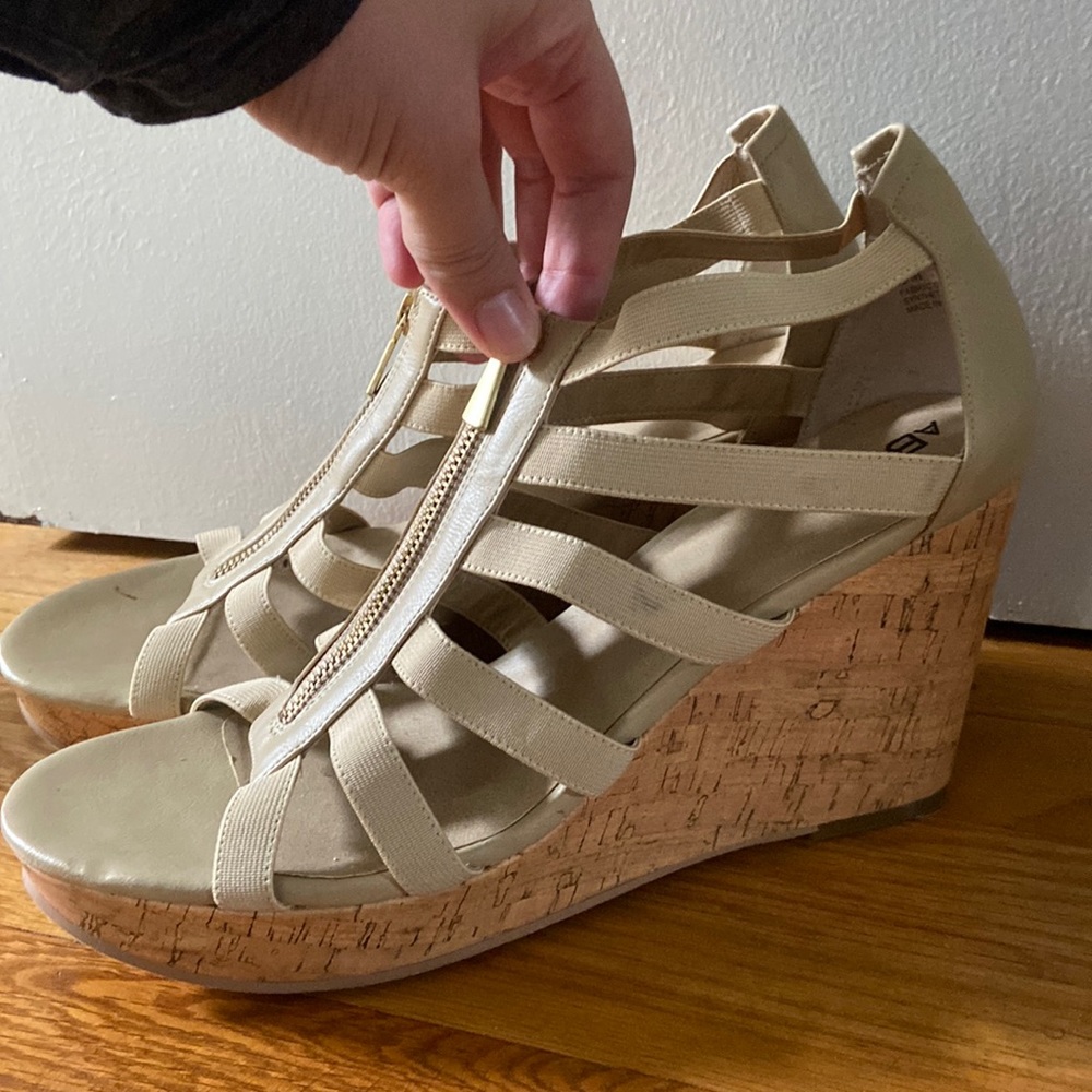 Tan, abound wedge sandals.